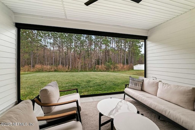 exterior space with ceiling fan and outdoor lounge area