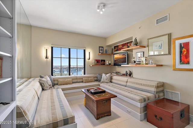 living room with light tile patterned floors