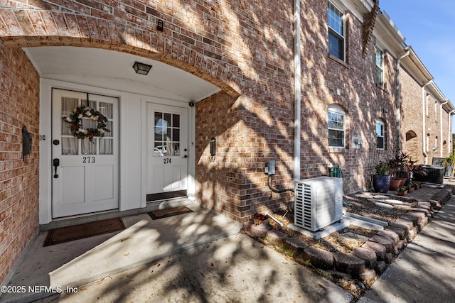 property entrance featuring ac unit