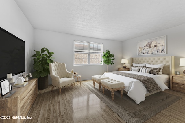 bedroom featuring a textured ceiling and hardwood / wood-style flooring