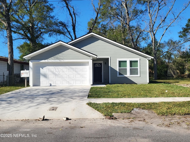 view of front facade featuring a front lawn and a garage