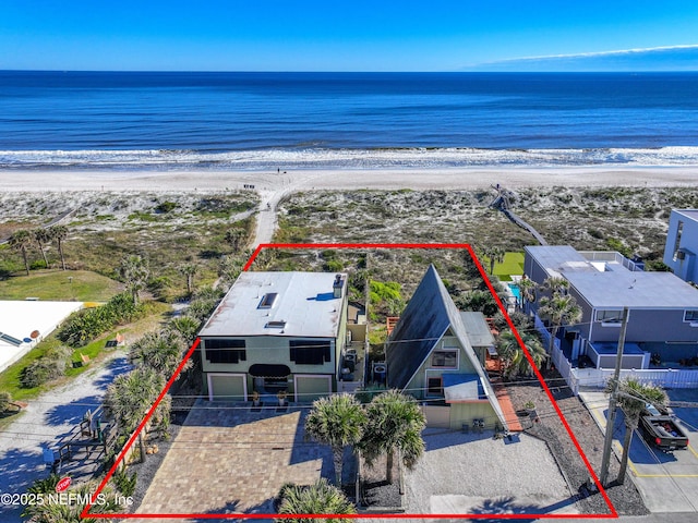 drone / aerial view with a view of the beach and a water view