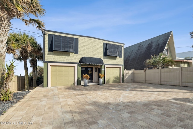 view of property with a garage