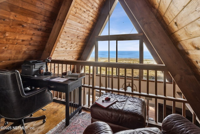 interior space with a water view, wood ceiling, hardwood / wood-style floors, and lofted ceiling with beams