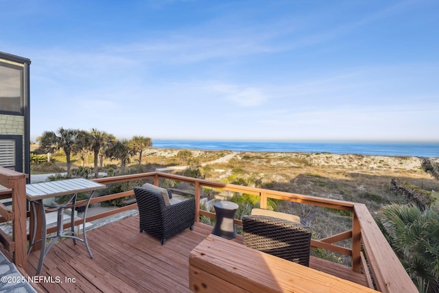 wooden terrace with a water view