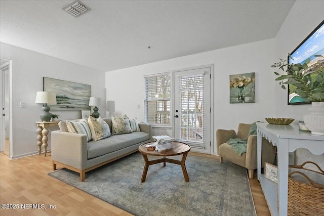 living room with hardwood / wood-style flooring