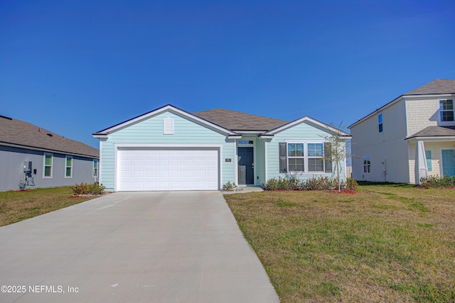 view of front facade featuring a front yard and a garage