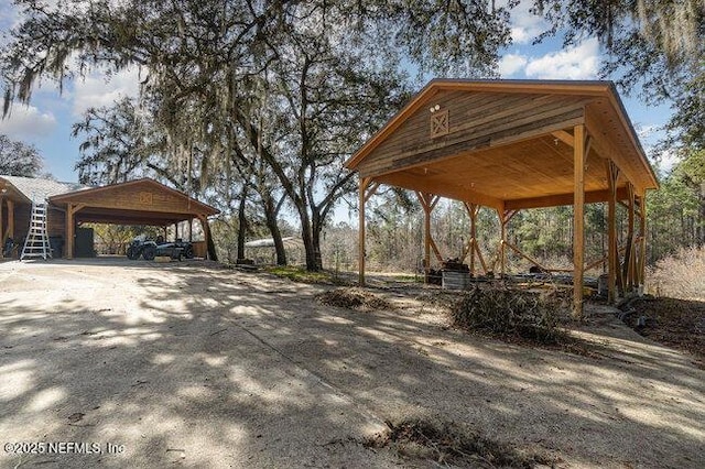 exterior space featuring a carport