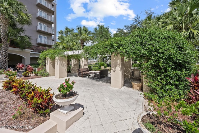 surrounding community featuring a patio