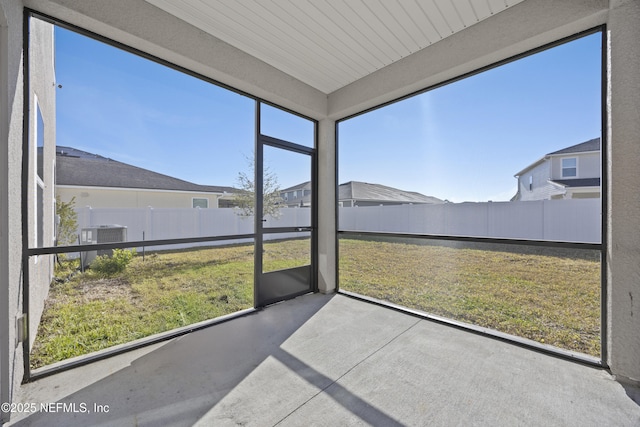 unfurnished sunroom with a healthy amount of sunlight