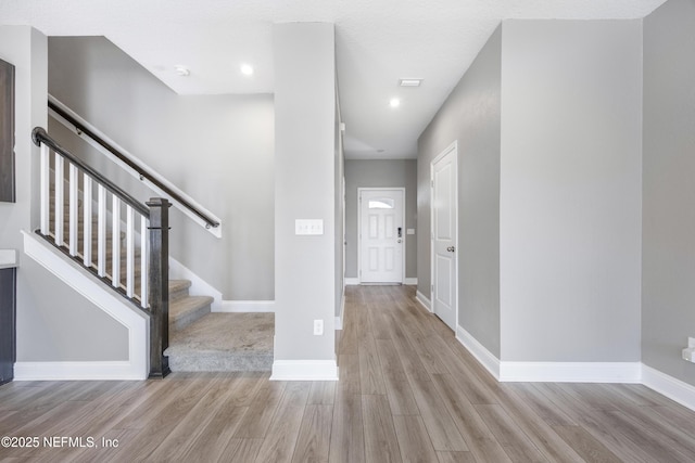 foyer entrance featuring light wood-type flooring