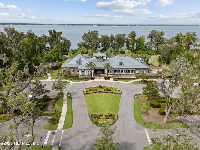 birds eye view of property featuring a water view