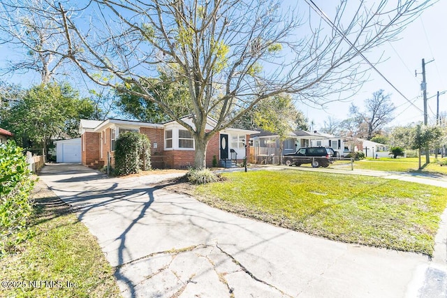 view of front facade featuring a front yard and a garage