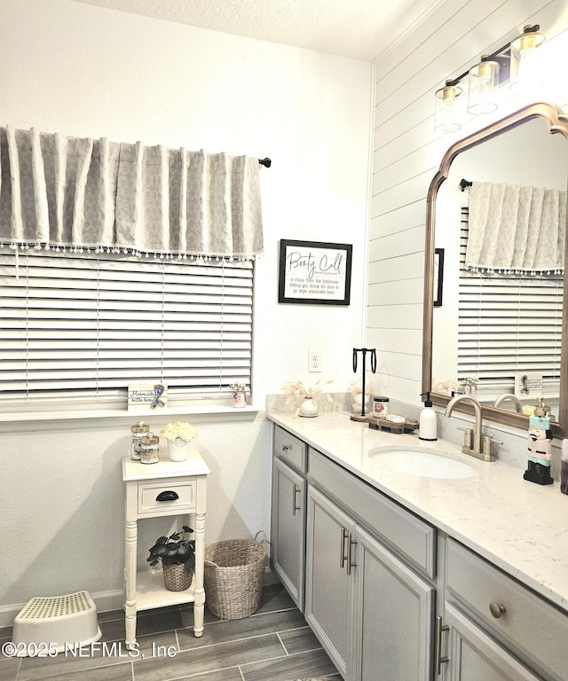 bathroom featuring vanity and a textured ceiling