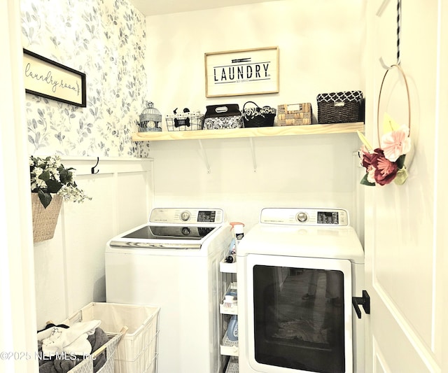 laundry room with washer and dryer