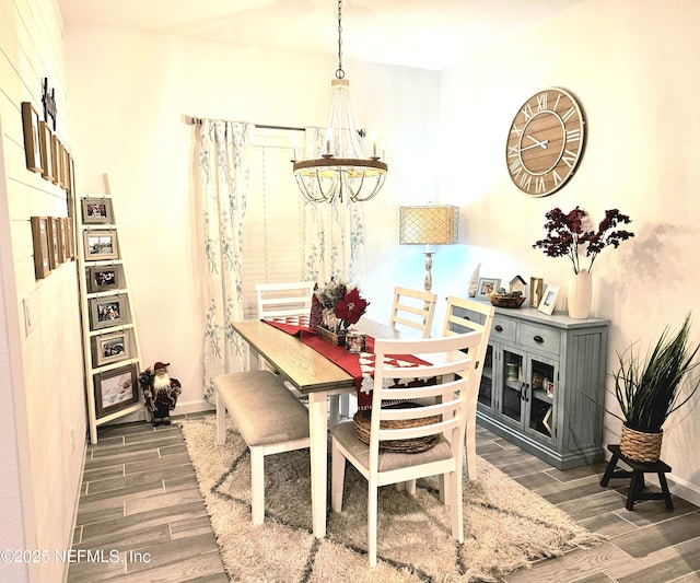 dining space with a notable chandelier