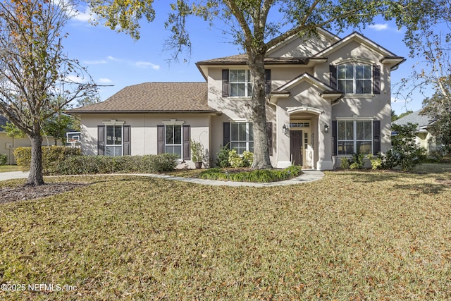 view of front of property with a front lawn