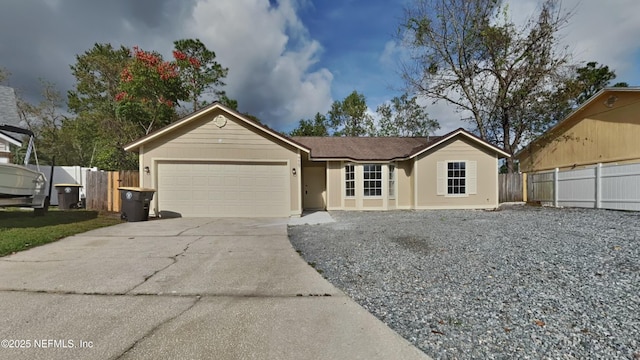 ranch-style house featuring a garage