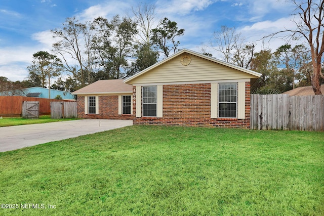 ranch-style home with a front yard