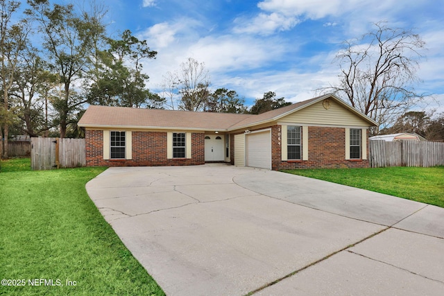 single story home featuring a front yard and a garage