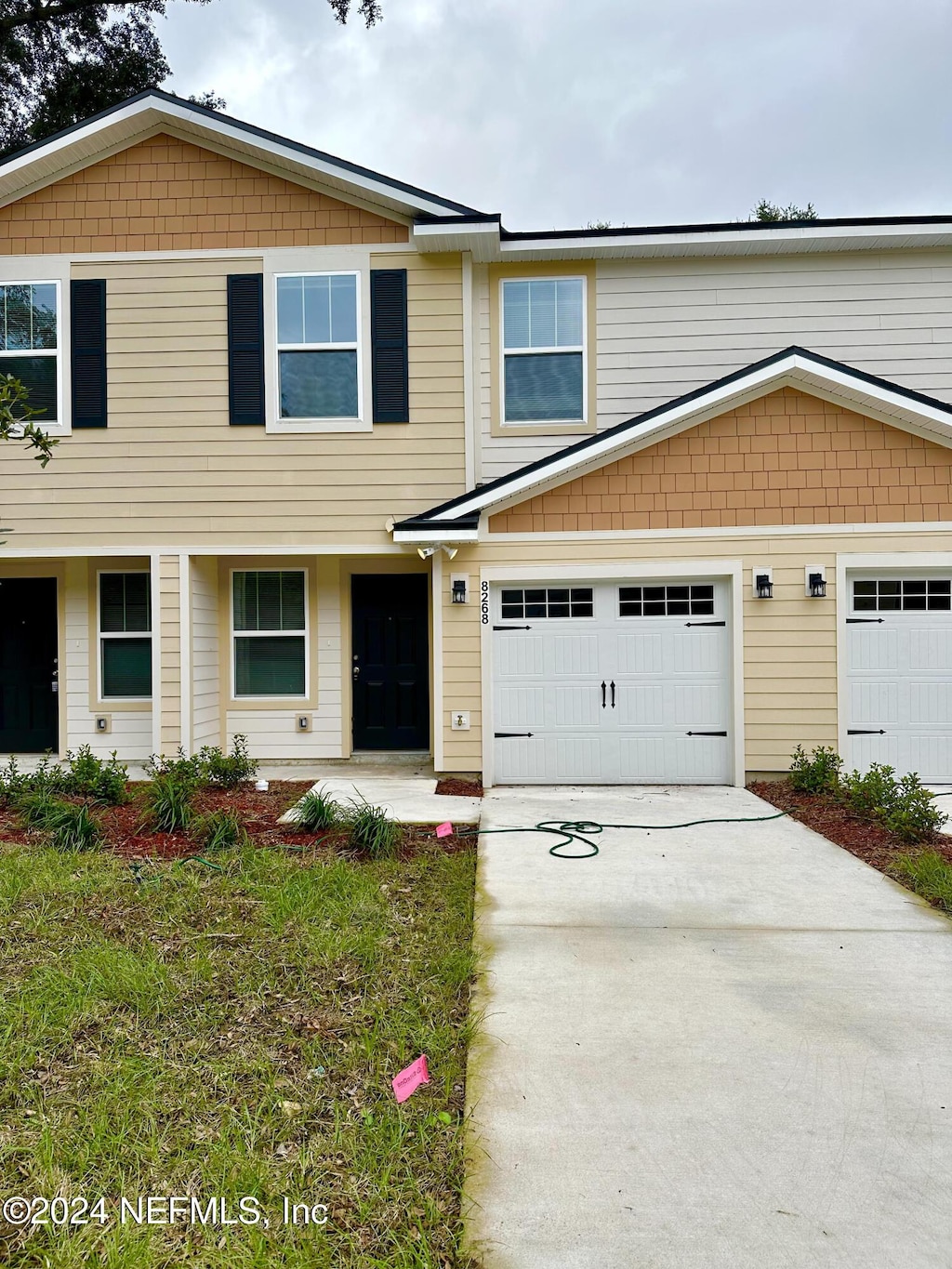 view of front of home with a garage