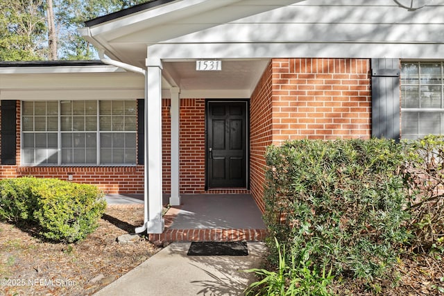 entrance to property with a porch