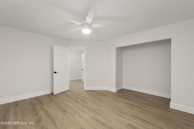 interior space with ceiling fan and light wood-type flooring