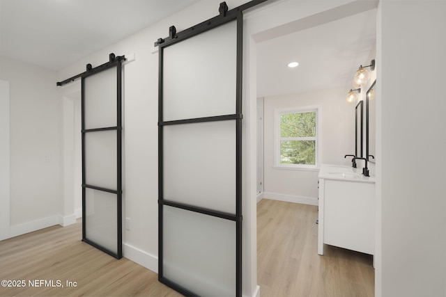 bathroom featuring vanity and hardwood / wood-style floors