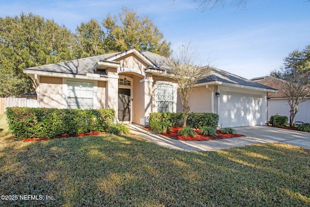 single story home with a front lawn and a garage