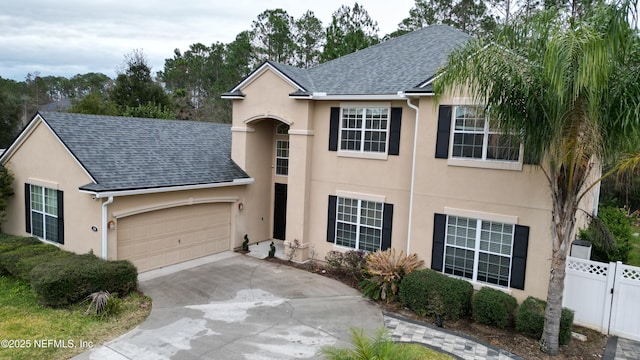 view of front of property with a garage