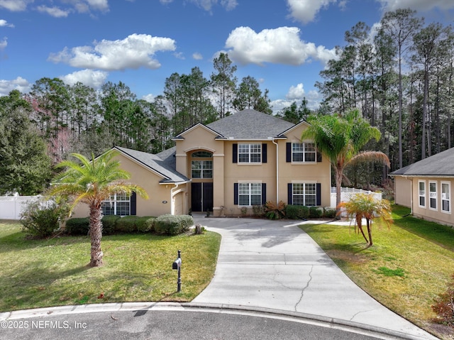 view of front of home featuring a front lawn