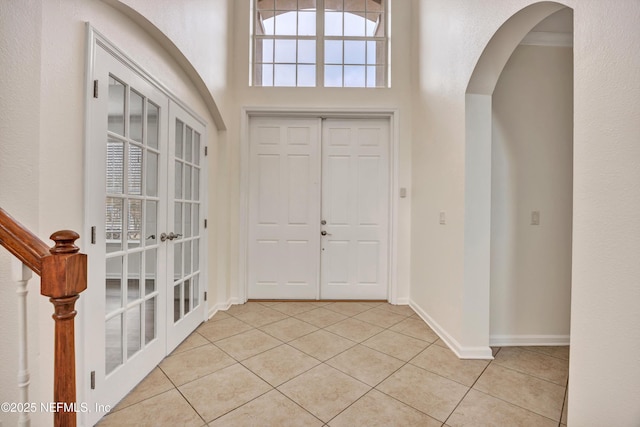 entrance foyer featuring light tile patterned flooring