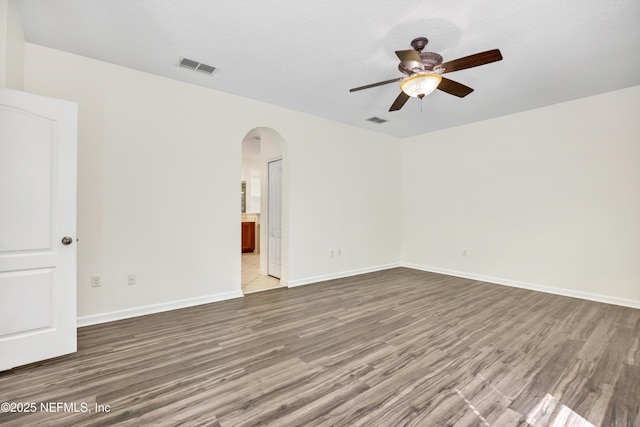 unfurnished room featuring ceiling fan and light hardwood / wood-style floors