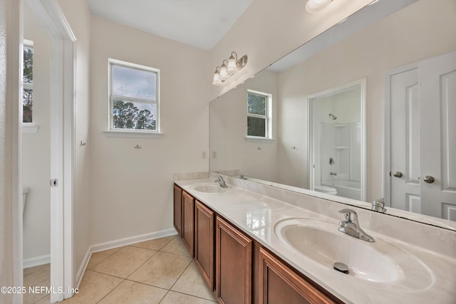 bathroom with vanity, bathtub / shower combination, and tile patterned floors