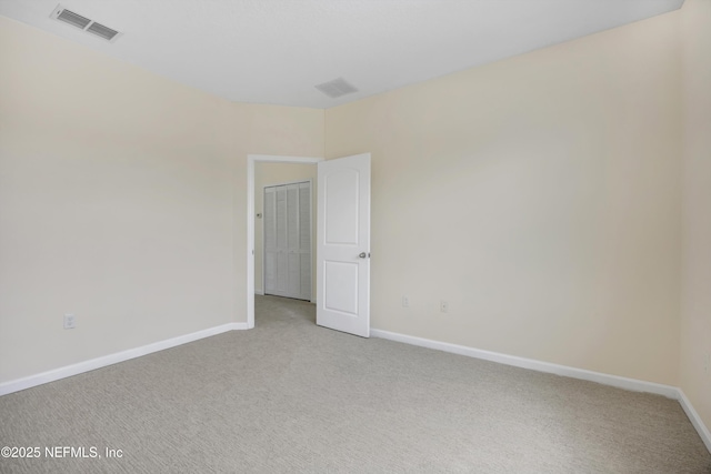 view of carpeted spare room