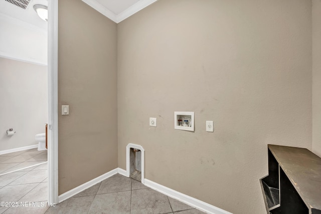 laundry area with ornamental molding, hookup for an electric dryer, washer hookup, and light tile patterned floors