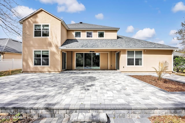 back of house featuring a patio and ceiling fan