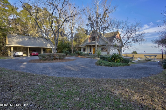 view of front of property with a carport