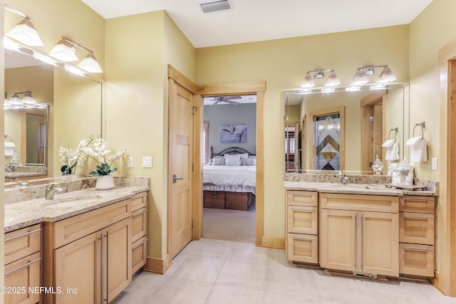 bathroom with vanity, tile patterned flooring, and ceiling fan