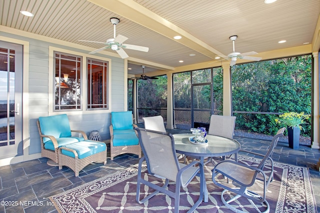 view of patio / terrace featuring ceiling fan