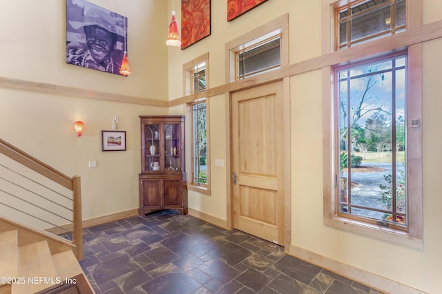 entrance foyer featuring a high ceiling