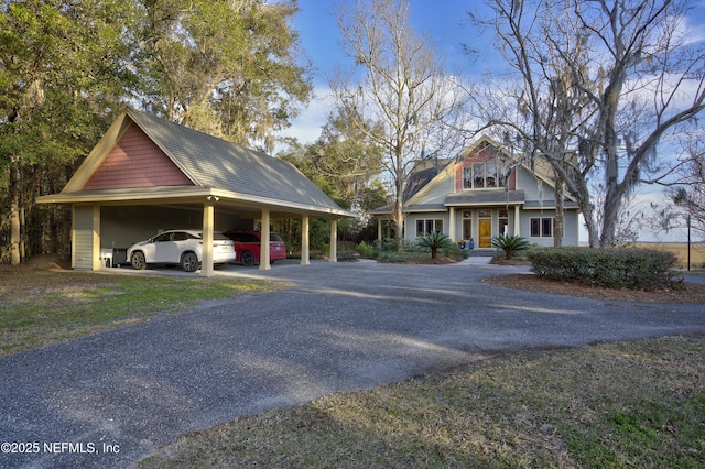 view of front facade featuring a carport and covered porch