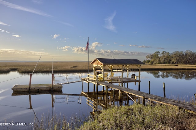 view of dock with a water view