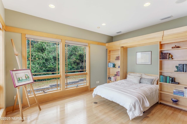 bedroom featuring hardwood / wood-style floors