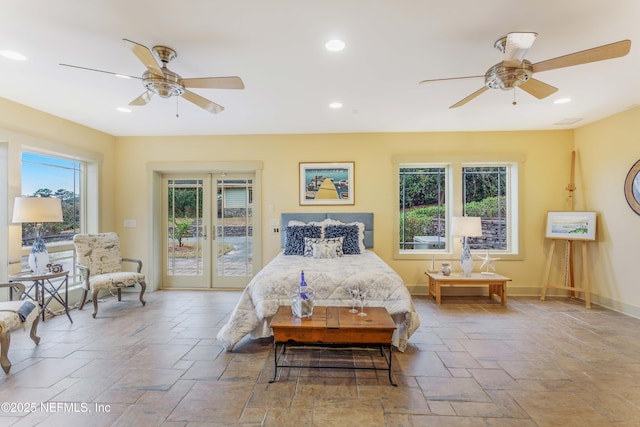 bedroom with access to outside and ceiling fan