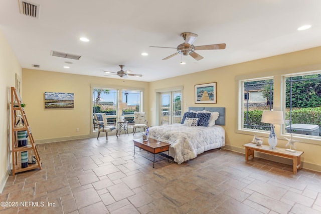 bedroom featuring ceiling fan and access to exterior