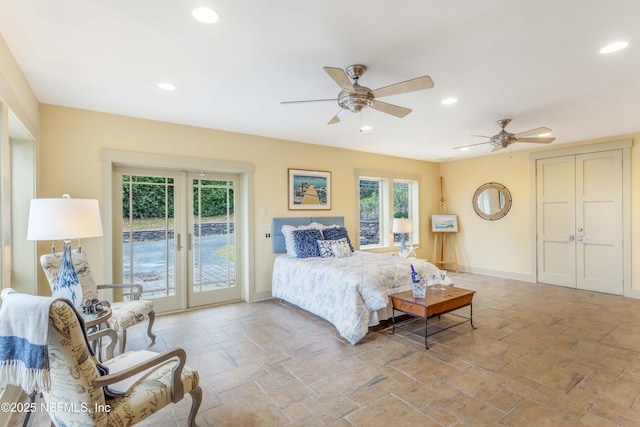 bedroom with french doors, ceiling fan, and access to outside