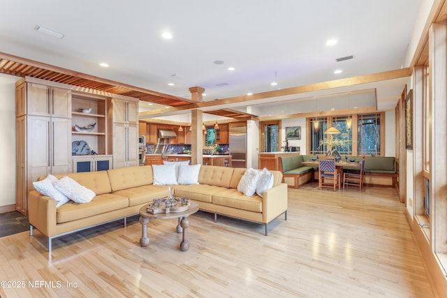 living room featuring light hardwood / wood-style floors