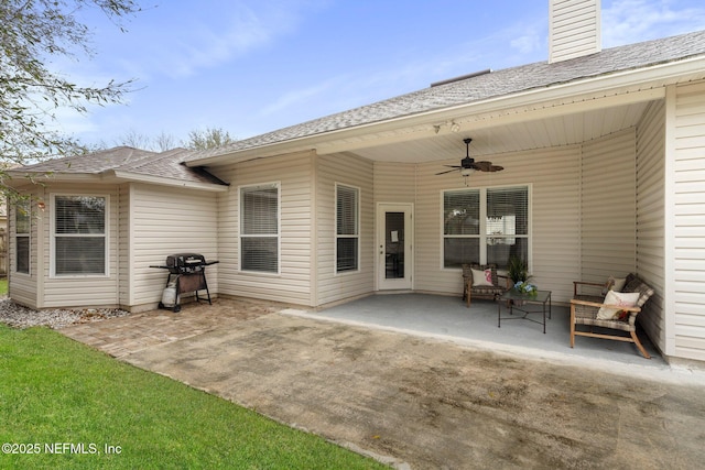 view of patio with ceiling fan and grilling area