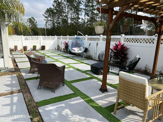 view of patio featuring a pergola